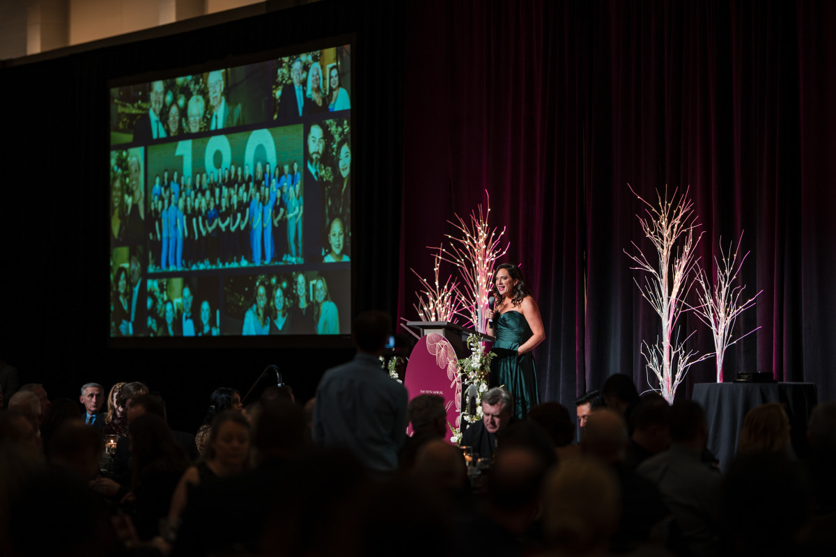 Photo: Speaker on the stage at Bella Ball