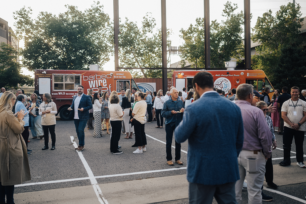 Photo of people waiting in line for food truck